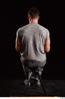  Larry Steel  1 boots dressed grey camo trousers grey t shirt shoes sitting whole body 0011.jpg